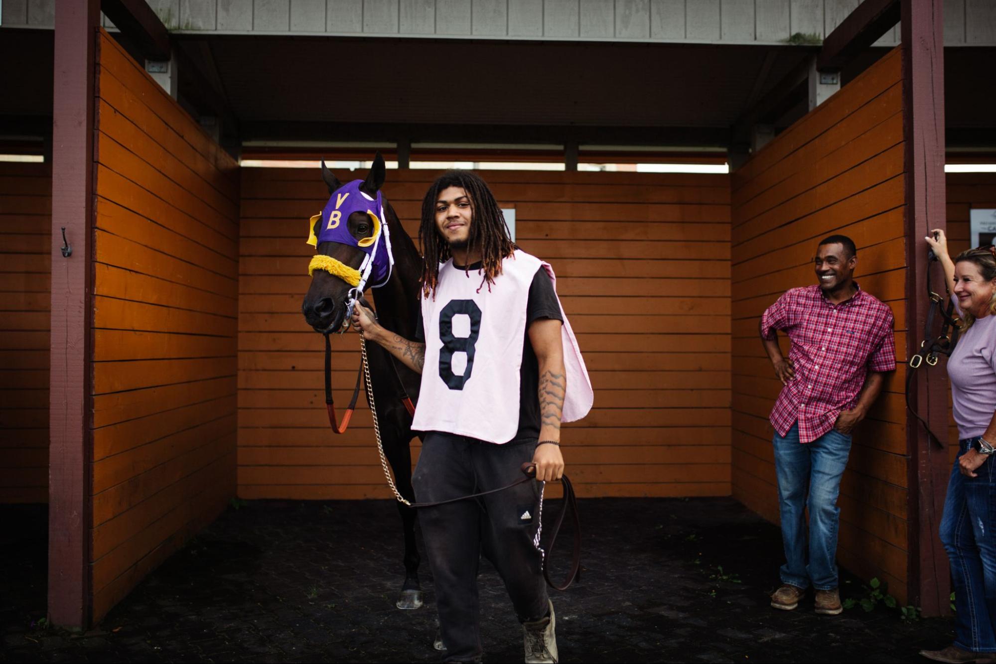A horse and their groom at Presque Isle Downs.
